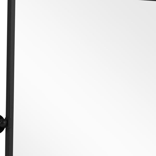 HomeRoots 31" Modern Black Metal Framed Accent Mirror – Sleek Design for Brightening Any Space with Style! 564452