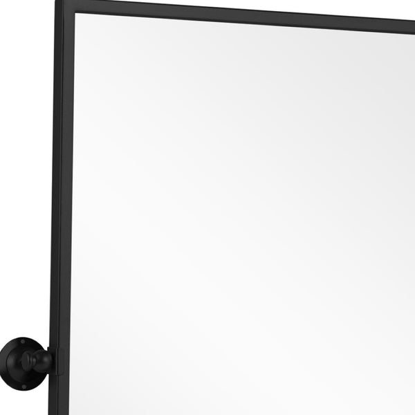 HomeRoots 31" Modern Black Metal Framed Accent Mirror – Sleek Design for Brightening Any Space with Style! 564452