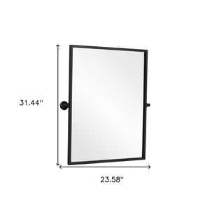 HomeRoots 31" Modern Black Metal Framed Accent Mirror – Sleek Design for Brightening Any Space with Style! 564452