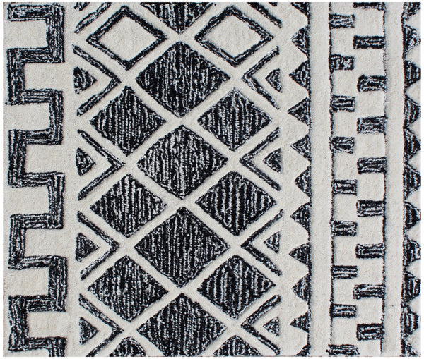 Homeroots 5' X 8' Black And Ivory Wool Abstract Geometric Hand Tufted Non Skid Area Rug  Wool 564707