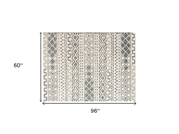 Homeroots 5' X 8' Black And Ivory Wool Abstract Geometric Hand Tufted Non Skid Area Rug  Wool 564707