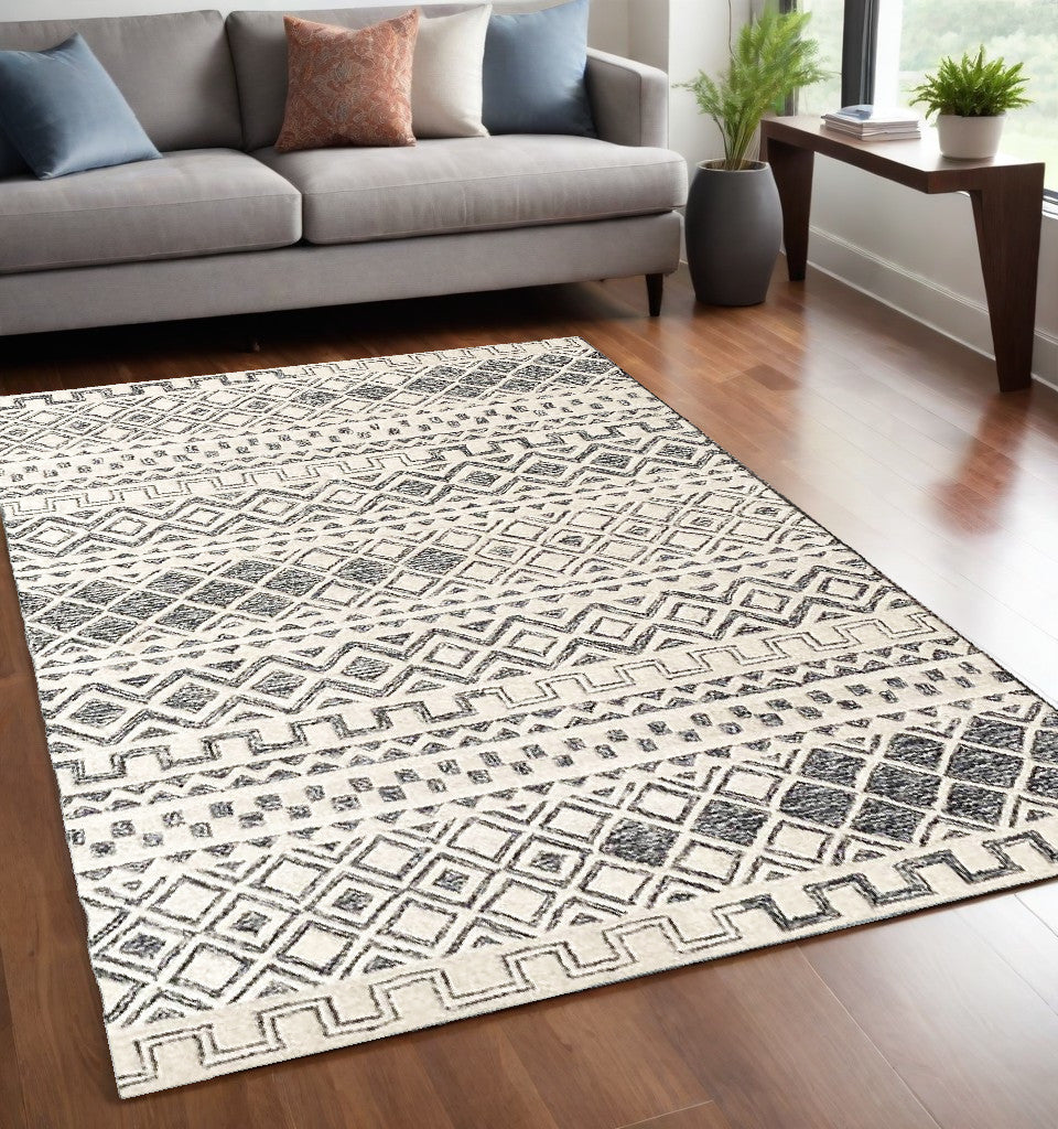 Homeroots 5' X 8' Black And Ivory Wool Abstract Geometric Hand Tufted Non Skid Area Rug  Wool 564707