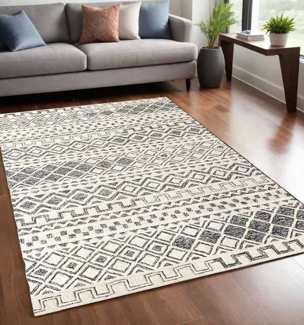 Homeroots 5' X 8' Black And Ivory Wool Abstract Geometric Hand Tufted Non Skid Area Rug  Wool 564707