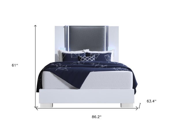 HomeRoots White Contemporary Queen Bed Frame with Gray Wood, Faux Leather, LED Lighted Headboard & Chrome Accents 564753