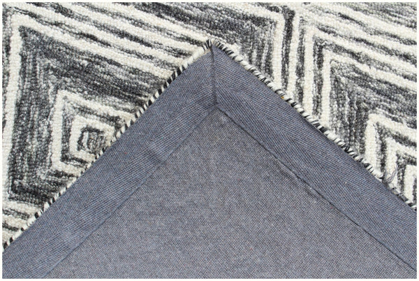 Homeroots 8' X 10' Black And Ivory Wool Abstract Geometric Hand Tufted Non Skid Area Rug  Wool 564799