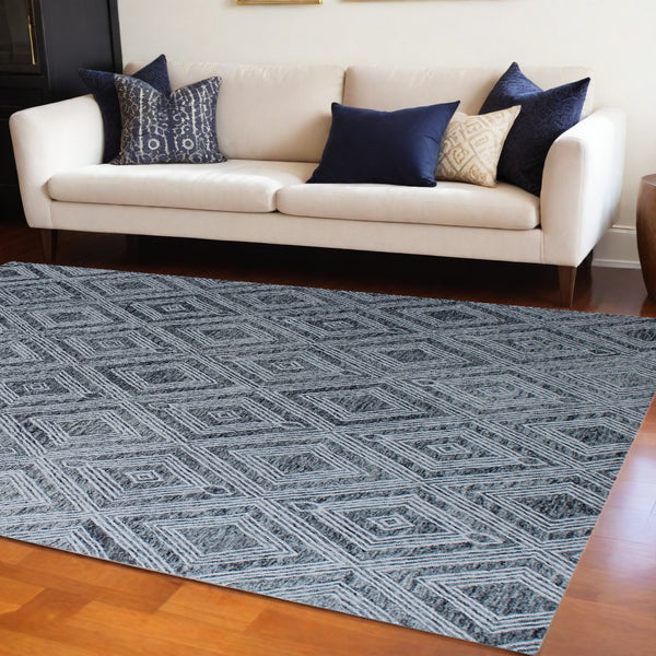 Homeroots 8' X 10' Black And Ivory Wool Abstract Geometric Hand Tufted Non Skid Area Rug  Wool 564799