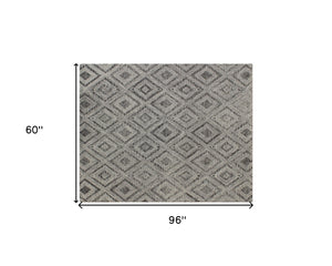 Homeroots 5' X 8' Black And Ivory Wool Abstract Geometric Hand Tufted Non Skid Area Rug  Wool 564800