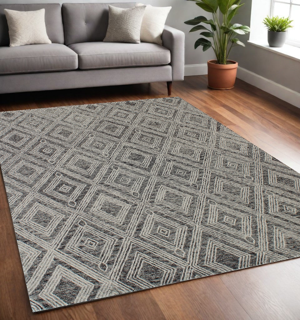 Homeroots 5' X 8' Black And Ivory Wool Abstract Geometric Hand Tufted Non Skid Area Rug  Wool 564800