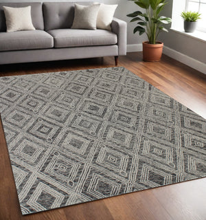 Homeroots 5' X 8' Black And Ivory Wool Abstract Geometric Hand Tufted Non Skid Area Rug  Wool 564800