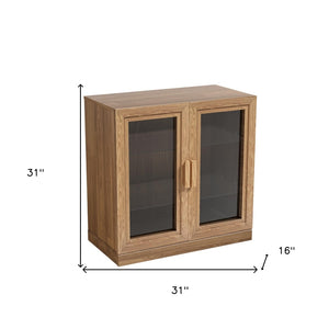 HomeRoots 31" Modern Clear Glass Door Accent Cabinet with 3 Adjustable Shelves for Stylish Storage Solutions 564864