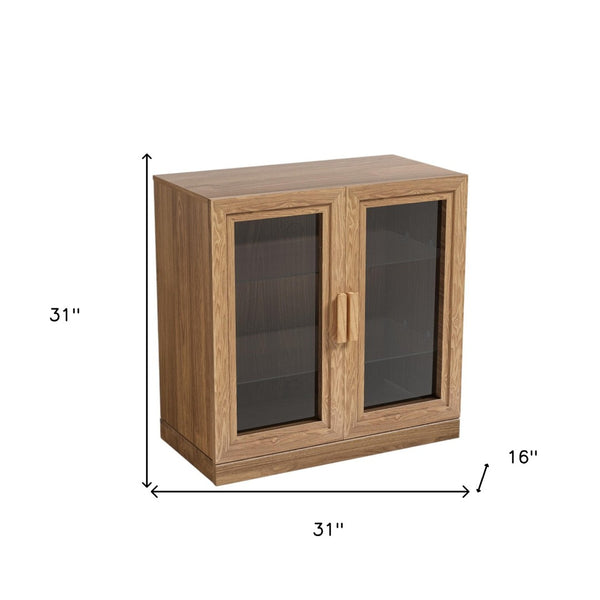HomeRoots 31" Modern Clear Glass Door Accent Cabinet with 3 Adjustable Shelves for Stylish Storage Solutions 564864