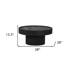 HomeRoots 28" Black Round Solid Wood Pedestal Coffee Table – Elegant Design for Contemporary Living Spaces 565164