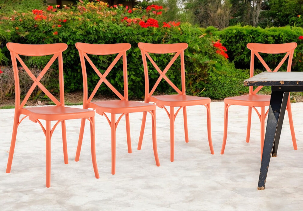 Homeroots Set Of Four 21" Salmon Heavy Duty Plastic Stacking Chairs - Stylish, Durable Outdoor Dining Comfort  Plastic 565177