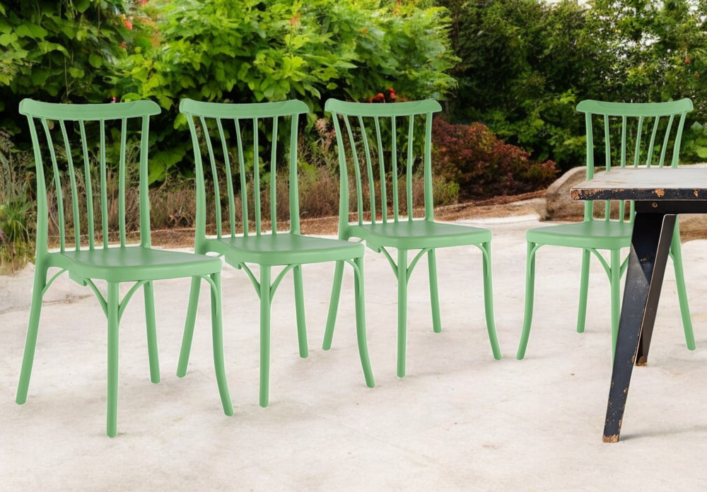 Homeroots Set Of Four 22" Green Heavy Duty Plastic Outdoor Stacking Chairs For Comfort And Style In Any Space  Plastic 565183