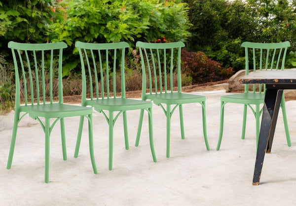 Homeroots Set Of Four 22" Green Heavy Duty Plastic Outdoor Stacking Chairs For Comfort And Style In Any Space  Plastic 565183