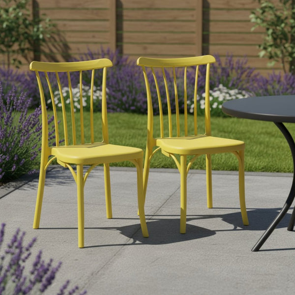 HomeRoots Set of Two Heavy-Duty Yellow Plastic Stacking Chairs for Outdoor Dining & Entertaining Spaces 565185