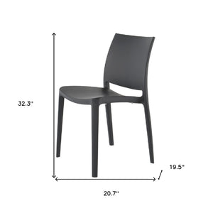 HomeRoots Set of Four Stylish Dark Gray Heavy-Duty Stacking Chairs for Outdoor Dining & Versatile Use 565210