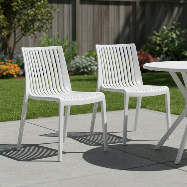 HomeRoots Set of Two Modern White Heavy-Duty Plastic Stacking Accent Chairs for Indoor and Outdoor Use 565230