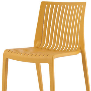 HomeRoots Set of Two Elegant Gold Stacking Chairs - Durable, Lightweight Outdoor Seating for Versatile Use 565231