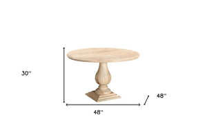 HomeRoots 48" Natural Solid Wood Pedestal Dining Table - Rustic Round Top, Inviting Design for Family Gatherings 565245