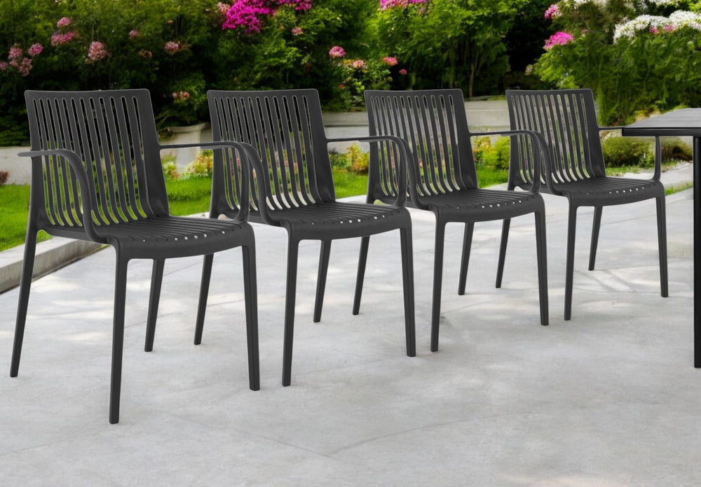 Homeroots Set Of Four 22" Black Heavy Duty Stacking Arm Chairs - Durable Outdoor Comfort & Stylish Design!  Polypropylene 565274