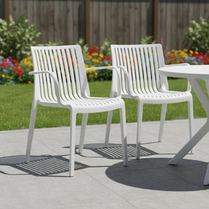 HomeRoots Set of Two White Heavy Duty Plastic Outdoor Arm Chairs - Durable, Stackable, and Versatile Seating 565275