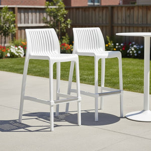 HomeRoots Set of Two 30" White Heavy-Duty Plastic Bar Height Chairs for Stylish Outdoor & Indoor Seating 565354