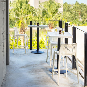 Homeroots Set Of Four Stylish 26" White Heavy Duty Plastic Low Back Outdoor Bar Chairs For Trendy Gatherings   565357