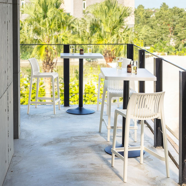 Homeroots Set Of Four Stylish 26" White Heavy Duty Plastic Low Back Outdoor Bar Chairs For Trendy Gatherings   565357