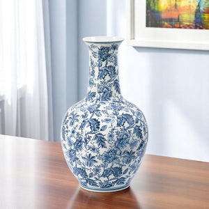 Homeroots 24" Elegant Blue And White Floral Curved Porcelain Vase – Stunning Centerpiece For Home Decor  Porcelain 565452