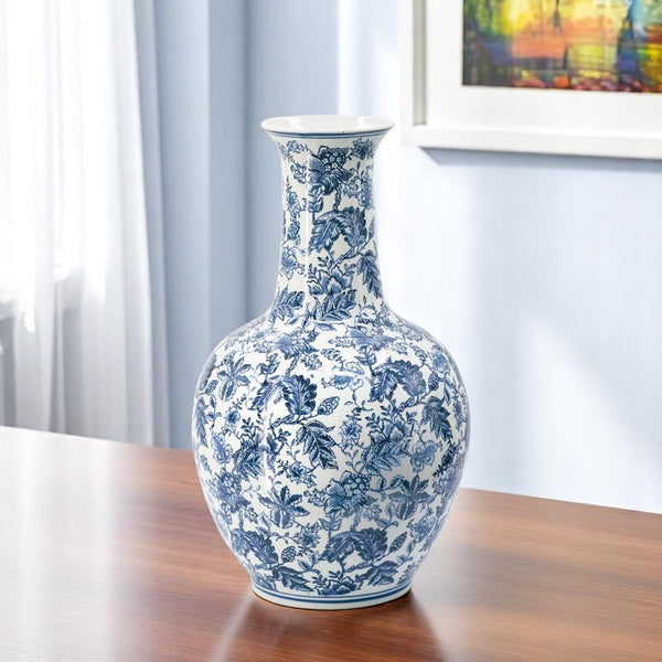 Homeroots 24" Elegant Blue And White Floral Curved Porcelain Vase – Stunning Centerpiece For Home Decor  Porcelain 565452