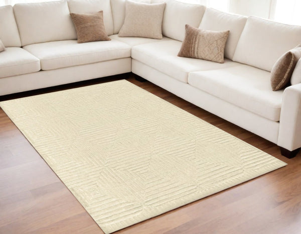 HomeRoots 4' Ivory Wool Geometric Hand-Knotted Area Rug - Durable, Stain-Resistant, Artisan-Crafted Elegance 6' X 9' 565478