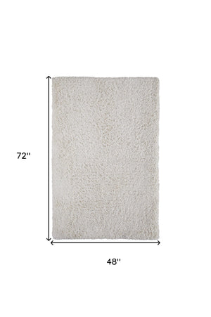 Homeroots 4' X 6' Ivory Shag Hand Tufted Area Rug Ivory Polyester 565491