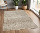 Homeroots 4' X 6' Gray Shag Hand Tufted Area Rug Tan Polyester 565504