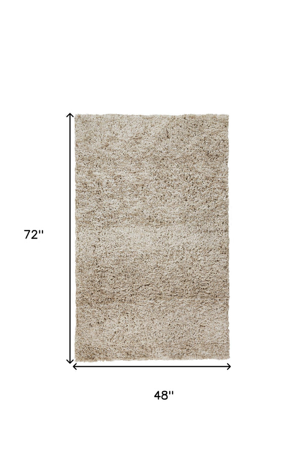 Homeroots 4' X 6' Gray Shag Hand Tufted Area Rug Tan Polyester 565504