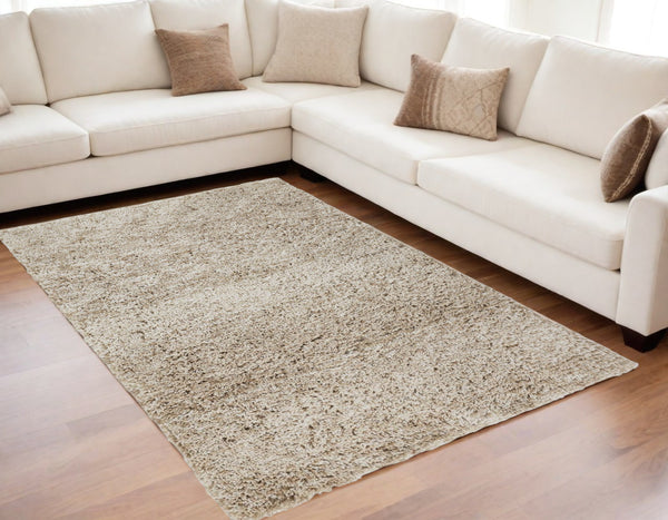 Homeroots 5' X 8' Gray Shag Hand Tufted Area Rug Gray Polyester 565505