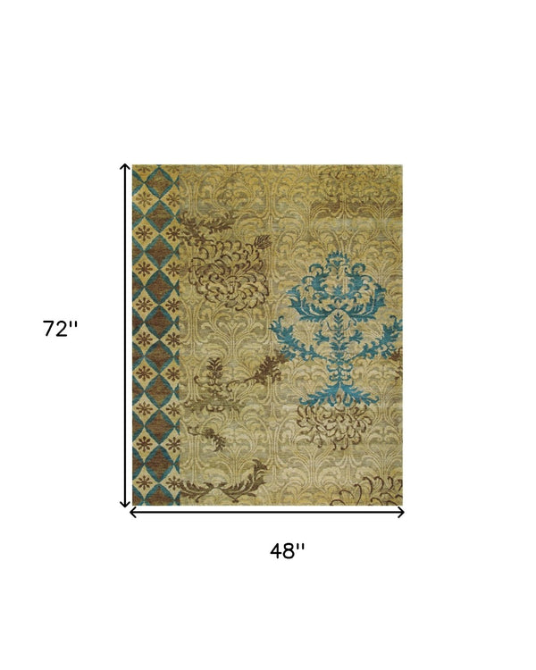 HomeRoots 4' Hand-Knotted Floral Area Rug in Tan, Blue, and Brown – Artisanal Elegance for Any Space 4' X 6' 565533