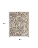 Homeroots 5' X 8' Brown Taupe And Tan Floral Power Loom Area Rug Brown Viscose 565552