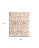 Homeroots 5' X 8' Taupe And Tan Floral Power Loom Area Rug Gray Viscose 565553