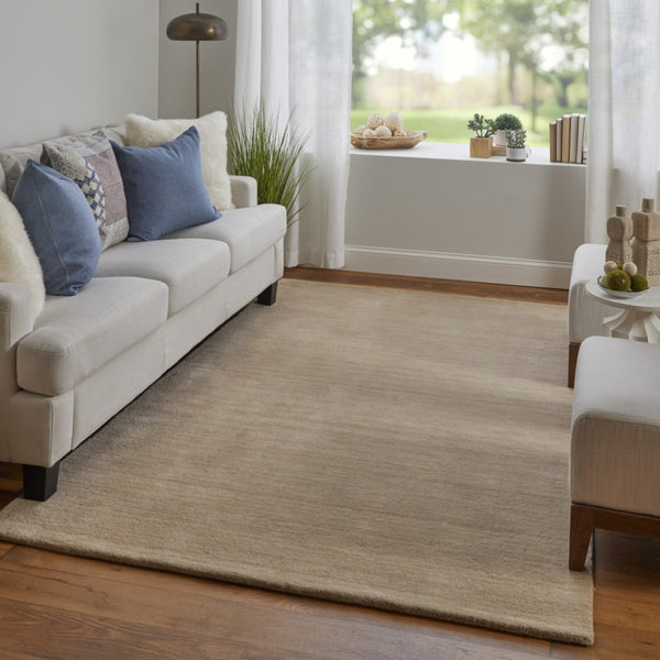 HomeRoots 4' Hand-Woven Tan Wool Area Rug – Elegant, Durable, and Stain-Resistant for Any Room in Your Home 9' X 13' 565591