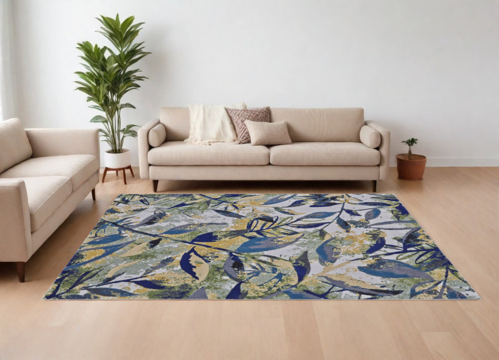 HomeRoots 10' Worn-Faded Floral Area Rug in Green, Blue, and Ivory - Timeless Charm for Any Space 10' X 13' 565656