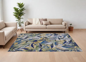 HomeRoots 10' Worn-Faded Floral Area Rug in Green, Blue, and Ivory - Timeless Charm for Any Space 10' X 13' 565656