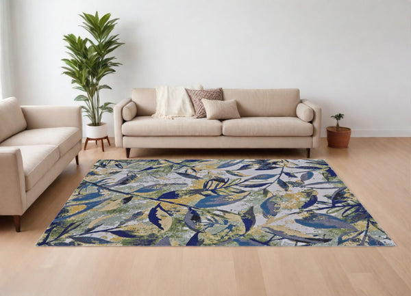 HomeRoots 10' Worn-Faded Floral Area Rug in Green, Blue, and Ivory - Timeless Charm for Any Space 10' X 13' 565656