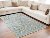 Homeroots 5' X 8' Blue Gray And Green Floral Power Loom Worn Faded Area Rug Blue Polypropylene 565702