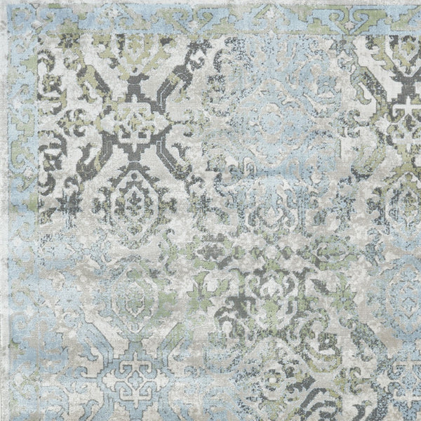 Homeroots 5' X 8' Blue Gray And Green Floral Power Loom Worn Faded Area Rug Blue Polypropylene 565702