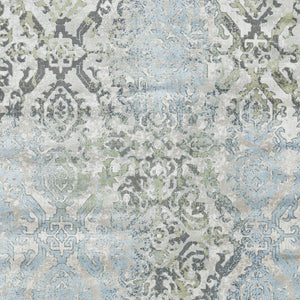 Homeroots 7' X 10' Blue Gray And Green Floral Power Loom Worn Faded Area Rug Blue Polypropylene 565703