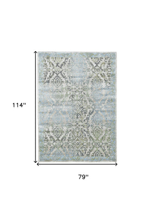 Homeroots 7' X 10' Blue Gray And Green Floral Power Loom Worn Faded Area Rug Blue Polypropylene 565703