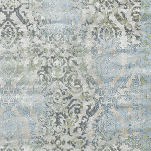 Homeroots 10' X 13' Blue Gray And Green Floral Power Loom Worn Faded Area Rug Blue Polypropylene 565705