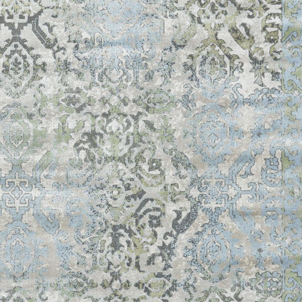Homeroots 10' X 13' Blue Gray And Green Floral Power Loom Worn Faded Area Rug Blue Polypropylene 565705
