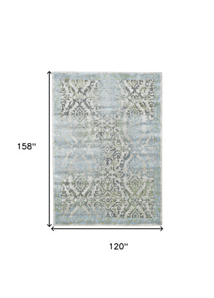 Homeroots 10' X 13' Blue Gray And Green Floral Power Loom Worn Faded Area Rug Blue Polypropylene 565705